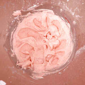 Strawberry Cream Cheese Frosting ingredients in a mixing bowl