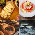 Uma variedade de pães gregos tradicionais, incluindo pães achatados e anéis de gergelim, expostos em superfícies de madeira e rústicas.